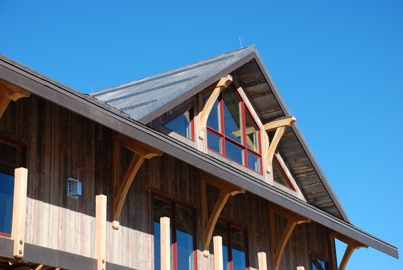 This is a close shot of the corrugated steel on the south&ndash;facing dormer. The horizontal steel ridges are snow stops. You can also see lightning rods along the ridge.