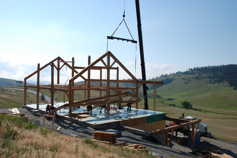 Bent 2 is being raised off the deck and out from under already&ndash;standing bent 3.