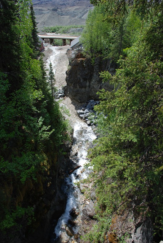 Here is a view from upstream of the Assay Office &mdash; the office is on the right just before the modern-day bridge. That bridge was recently rebuilt after being destroyed in a flood. <span class='myGreyFont'>[End of series. <a href='../index.html'>Return</a> to the Photos page.]</span>